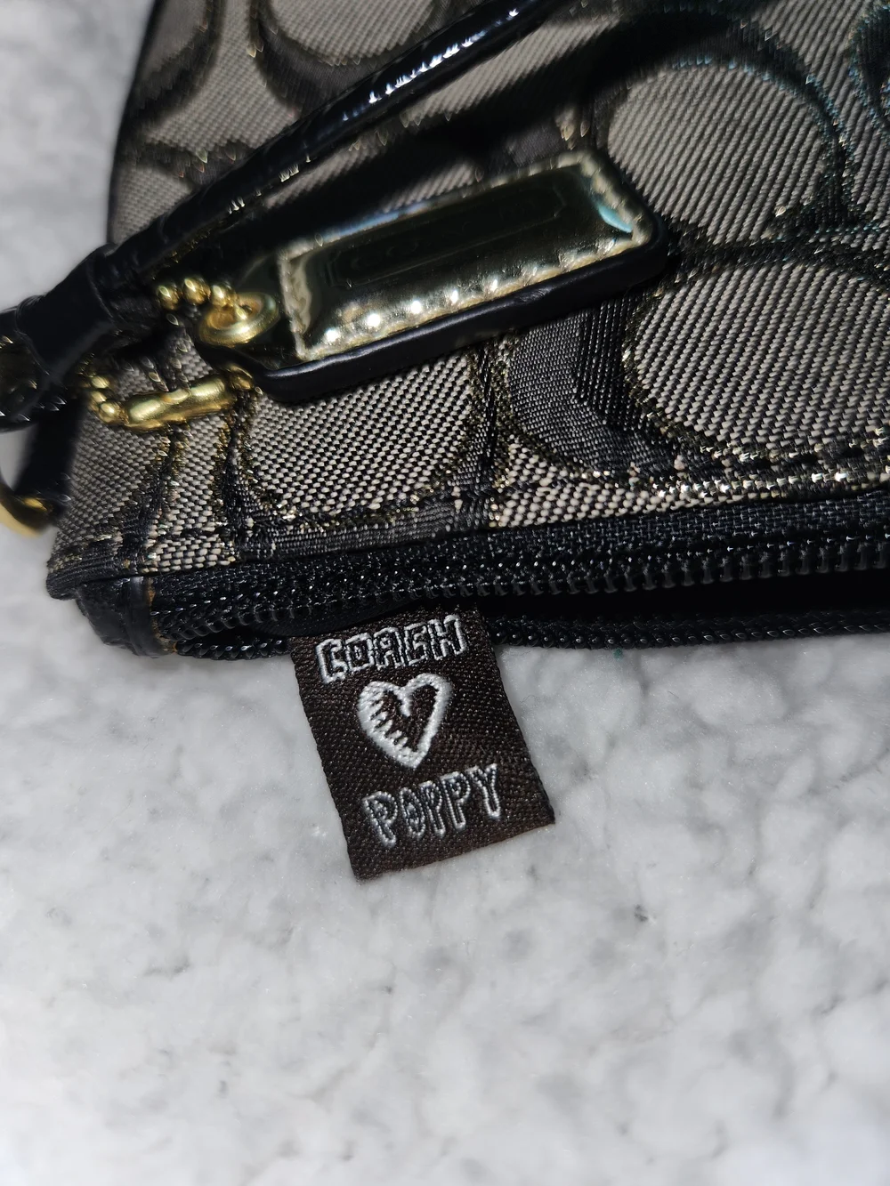 Coach Poppy Wristlet in Black and Gold Hardware